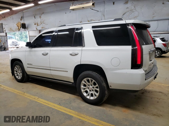 2015 GMC Yukon Denali with VIN 1GKS2CKJ1FR191804, listed as a Copart auction lot 68242514 with 250,403 mi miles and Salvage Title. Bid and sale history available at carsss.com. Image 2.