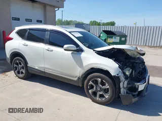 2018 Honda CR-V Touring with VIN 2HKRW2H92JH662753, listed as a IAAI auction lot 39538586 with 83,202 mi miles. Bid and sale history available at carsss.com. Image 1.