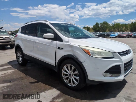 2013 Ford Escape SE with VIN 1FMCU9GX9DUD12210, listed as a Copart auction lot 62496095 with 77,516 mi miles and Salvage title. Bid and sale history available at DreamBid. Image 14.