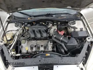 2008 Mercury Milan with VIN 3MEHM07138R649873, listed as a Copart auction lot 73098794 with 297,898 mi miles and Salvage title. Bid and sale history available at DreamBid. Image 13.