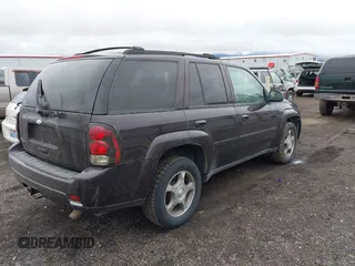 2009 Chevrolet TrailBlazer LT w/2LT with VIN 1GNDT33S892125280, listed as a IAAI auction lot 41899329 with 241,701 mi miles. Bid and sale history available at carsss.com. Image 4.