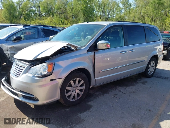 2011 Chrysler Town & Country Touring L z VIN 2A4RR8DG8BR712567, wystawiony jako IAAI lot #42078288 z przebiegiem 144 409 mil mil oraz . Historia ofert i sprzedaży dostępna na DreamBid. Obrazek 2.