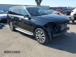 2018 Mercedes-Benz GLS with VIN 4JGDF6EE2JB135683, listed as a IAAI auction lot 41960302 with 139,778 mi miles. Bid and sale history available at carsss.com. Image 1.