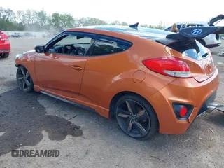 2013 Hyundai Veloster Turbo z VIN KMHTC6AE1DU101236, wystawiony jako IAAI lot #42230984 z przebiegiem 131 854 mil mil oraz . Historia ofert i sprzedaży dostępna na DreamBid. Obrazek 3.