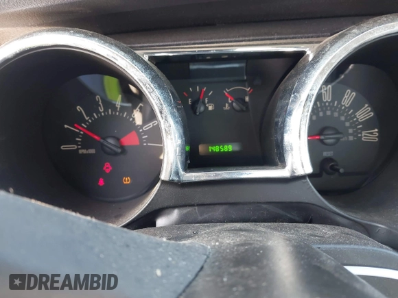 2008 Ford Mustang Deluxe z VIN 1ZVHT80N085129002, wystawiony jako IAAI lot #41796077 z przebiegiem 148 589 mil mil oraz . Historia ofert i sprzedaży dostępna na DreamBid. Obrazek 7.