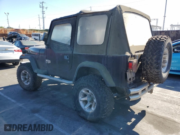 1992 Jeep Wrangler with VIN 2J4FY29S5NJ505850, listed as a Copart auction lot 64117655 with 93,250 mi miles and Clean title. Bid and sale history available at DreamBid. Image 2.