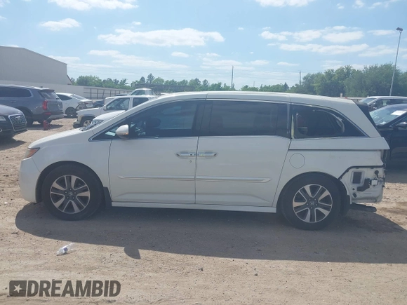2016 Honda Odyssey Touring Elite with VIN 5FNRL5H98GB102544, listed as a IAAI auction lot 42040050 with 128,957 mi miles and . Bid and sale history available at DreamBid. Image 15.