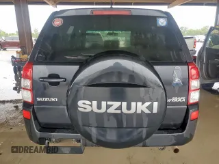 2011 Suzuki Grand Vitara Premium with VIN JS3TD0D28B4102365, listed as a Copart auction lot 60560495 with 176,190 mi miles and Salvage title. Bid and sale history available at DreamBid. Image 6.
