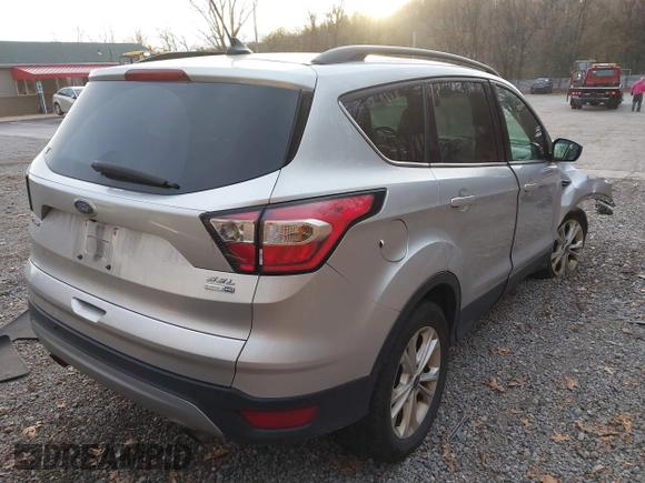 2018 Ford Escape SEL with VIN 1FMCU9HD6JUA58844, listed as a IAAI auction lot 40863795 with 74,907 mi miles. Bid and sale history available at carsss.com. Image 4.