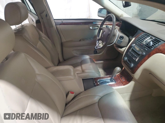 2006 Cadillac DTS 1SC z VIN 1G6KD57Y76U141402, wystawiony jako Copart lot #58715675 z przebiegiem 148 042 mil mil oraz Szkoda całkowita • Salvage title. Historia ofert i sprzedaży dostępna na DreamBid. Obrazek 7.