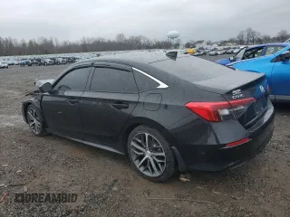 2024 Honda Civic Touring z VIN 2HGFE1F97RH316075, wystawiony jako Copart lot #50006805 z przebiegiem Nie podano mil oraz Szkoda całkowita • Salvage title. Historia ofert i sprzedaży dostępna na DreamBid. Obrazek 2.