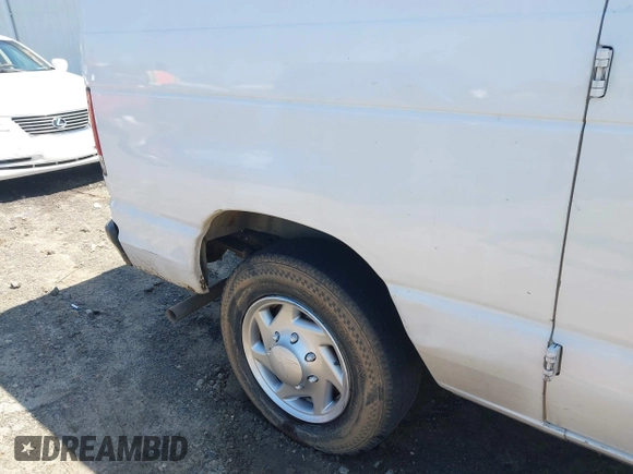 2014 Ford Econoline Cargo Commercial with VIN 1FTNE1EW2EDA99687, listed as a IAAI auction lot 41994371 with 204,466 mi miles and . Bid and sale history available at DreamBid. Image 6.