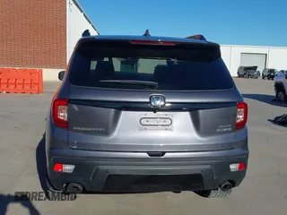 2019 Honda Passport Elite z VIN 5FNYF8H07KB015720, wystawiony jako IAAI lot #41221298 z przebiegiem 65 747 mil mil oraz . Historia ofert i sprzedaży dostępna na DreamBid. Obrazek 17.