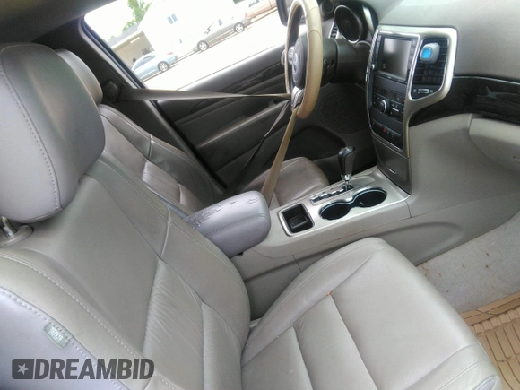 2012 Jeep Grand Cherokee Laredo with VIN 1C4RJEAGXCC157616, listed as a IAAI auction lot 42156539 with 301,661 mi miles. Bid and sale history available at carsss.com. Image 5.