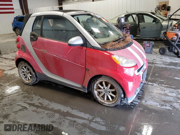 2009 Smart fortwo Passion z VIN WMEEK31X69K239682, wystawiony jako Copart lot #50466415 z przebiegiem Nie podano mil oraz Czysty tytuł • Clean title. Historia ofert i sprzedaży dostępna na DreamBid. Obrazek 4.