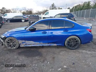 2020 BMW 3 Series M340i xDrive with VIN WBA5U9C00LFH03223, listed as a IAAI auction lot 41020498 with 58,775 mi miles and . Bid and sale history available at DreamBid. Image 14.
