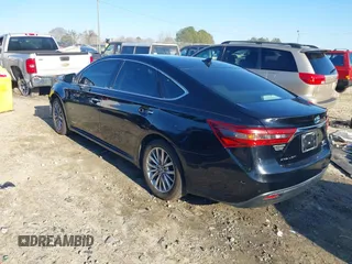2016 Toyota Avalon XLE Premium z VIN 4T1BD1EB8GU050656, wystawiony jako IAAI lot #41472112 z przebiegiem 183 597 mil mil oraz . Historia ofert i sprzedaży dostępna na DreamBid. Obrazek 3.