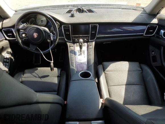 2014 Porsche Panamera S E-Hybrid z VIN WP0AD2A78EL044818, wystawiony jako Copart lot #65864484 z przebiegiem 141 423 mil mil oraz Szkoda całkowita • Salvage title. Historia ofert i sprzedaży dostępna na DreamBid. Obrazek 8.