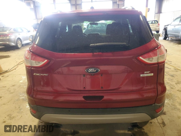 2014 Ford Escape SE с VIN 1FMCU0GX0EUB75736, выставлен на аукционе Copart как лот 57603105 с пробегом 86 480 миль миль и Списание • Salvage title. История ставок и продаж доступна на DreamBid. Изображение 6.