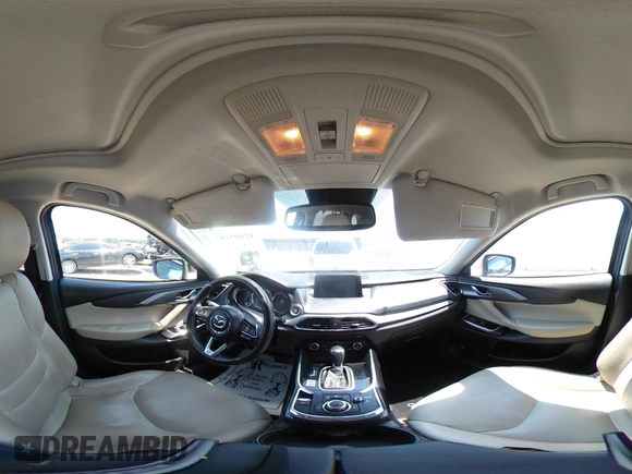 2018 Mazda CX-9 Touring with VIN JM3TCBCY3J0220372, listed as a IAAI auction lot 42405192 with 104,556 mi miles and . Bid and sale history available at DreamBid. Image 18.