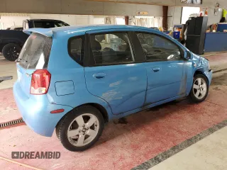 2006 Chevrolet Aveo LT with VIN KL1TG66686B652568, listed as a Copart auction lot 61491885 with 128,599 mi miles and Salvage title. Bid and sale history available at DreamBid. Image 3.