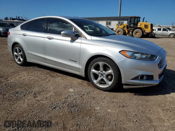 2013 Ford Fusion SE Hybrid z VIN 3FA6P0LU8DR325849, wystawiony jako Copart lot #53520515 z przebiegiem 93 615 mil mil oraz Czysty tytuł • Clean title. Historia ofert i sprzedaży dostępna na DreamBid. Obrazek 4.