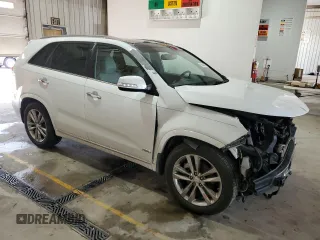 2015 Kia Sorento SX с VIN 5XYKWDA77FG641644, выставлен на аукционе Copart как лот 56843785 с пробегом 144 832 миль миль и Списание • Salvage title. История ставок и продаж доступна на DreamBid. Изображение 4.