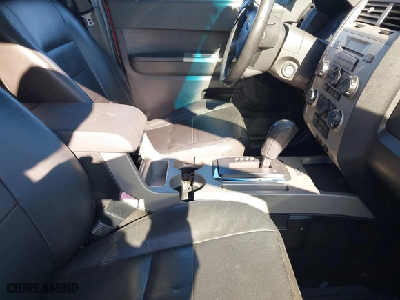 2009 Ford Escape XLT with VIN 1FMCU93G09KB76882, listed as a IAAI auction lot 41810579 with 167,584 mi miles. Bid and sale history available at carsss.com. Image 5.