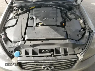 2003 Infiniti Q45 z VIN JNKBF01A03M101890, wystawiony jako Copart lot #86930994 z przebiegiem 158 134 mil mil oraz Szkody całkowita. Historia ofert i sprzedaży dostępna na DreamBid. Obrazek 13.