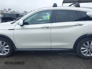 2019 Infiniti QX50 LUXE with VIN 3PCAJ5M16KF116521, listed as a IAAI auction lot 41793978 with 70,007 mi miles. Bid and sale history available at carsss.com. Image 14.