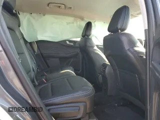 2021 Ford Escape Titanium Plug-In Hybrid z VIN 1FMCU0LZ1MUB17737, wystawiony jako Copart lot #57162592 z przebiegiem Nie podano mil oraz . Historia ofert i sprzedaży dostępna na DreamBid. Obrazek 6.