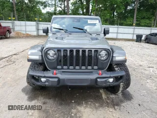 2021 Jeep Gladiator Rubicon с VIN 1C6JJTBG5ML507579, выставлен на аукционе Copart как лот 60409785 с пробегом 62 585 миль миль и Списание • Salvage title. История ставок и продаж доступна на DreamBid. Изображение 5.