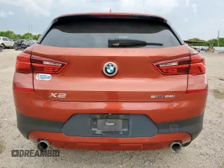 2018 BMW X2 sDrive28i with VIN WBXYJ3C37JEJ75893, listed as a Copart auction lot 62513565 with 62,029 mi miles and Salvage title. Bid and sale history available at DreamBid. Image 6.