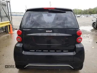 2013 Smart fortwo Pure z VIN WMEEJ3BA0DK671030, wystawiony jako Copart lot #53307075 z przebiegiem 57 779 mil mil oraz Szkody całkowita. Historia ofert i sprzedaży dostępna na DreamBid. Obrazek 6.