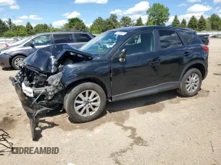 2016 Mazda CX-5 Touring z VIN JM3KE4CY5G0907895, wystawiony jako Copart lot #58038825 z przebiegiem Nie podano mil oraz Szkoda całkowita • Salvage title. Historia ofert i sprzedaży dostępna na DreamBid. Obrazek 1.