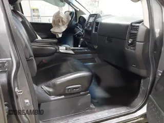 2014 Nissan Titan S with VIN 1N6AA0EC6EN513801, listed as a IAAI auction lot 41762295 with 128,412 mi miles and . Bid and sale history available at DreamBid. Image 5.