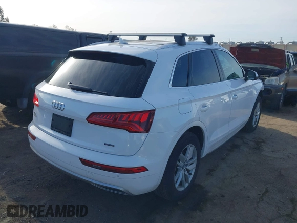 2020 Audi Q5 Premium z VIN WA1ANAFY2L2046974, wystawiony jako IAAI lot #41933942 z przebiegiem 53 911 mil mil oraz . Historia ofert i sprzedaży dostępna na DreamBid. Obrazek 4.