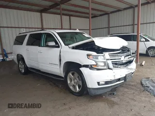 2018 Chevrolet Suburban Premier z VIN 1GNSCJKC5JR393141, wystawiony jako IAAI lot #42081580 z przebiegiem 136 112 mil mil oraz . Historia ofert i sprzedaży dostępna na DreamBid. Obrazek 1.
