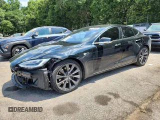 2020 Tesla Model S Long Range with VIN 5YJSA1E20LF412754, listed as a Copart auction lot 61774825 with 44,056 mi miles and Salvage title. Bid and sale history available at DreamBid. Image 1.