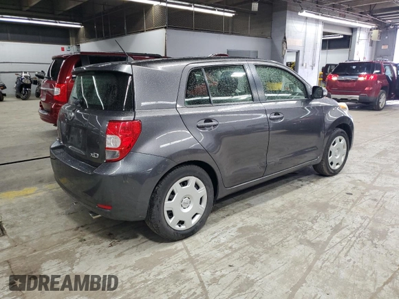 2012 Scion xD z VIN JTKKU4B43C1026426, wystawiony jako Copart lot #55339955 z przebiegiem 106 648 mil mil oraz Szkoda całkowita • Salvage title. Historia ofert i sprzedaży dostępna na DreamBid. Obrazek 3.