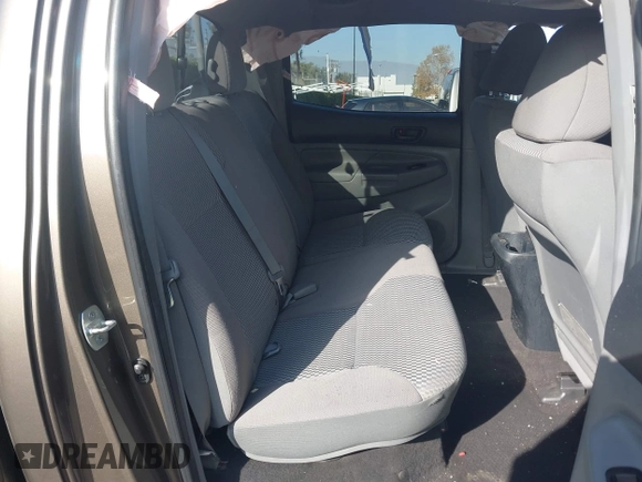 2013 Toyota Tacoma PreRunner z VIN 5TFJU4GN1DX046628, wystawiony jako IAAI lot #41216083 z przebiegiem Nie podano mil oraz . Historia ofert i sprzedaży dostępna na DreamBid. Obrazek 8.
