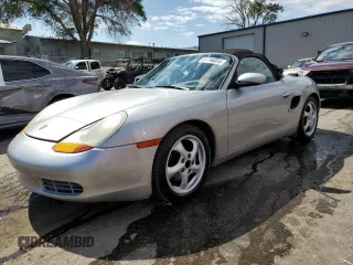 1998 Porsche Boxster z VIN WP0CA2987WU622367, wystawiony jako Copart lot #61746054 z przebiegiem 105 815 mil mil oraz Szkoda całkowita • Salvage title. Historia ofert i sprzedaży dostępna na DreamBid. Obrazek 1.