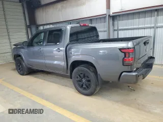 2023 Nissan Frontier SV with VIN 1N6ED1EK9PN607356, listed as a Copart auction lot 64363254 with 15,065 mi miles and Salvage Title. Bid and sale history available at carsss.com. Image 2.