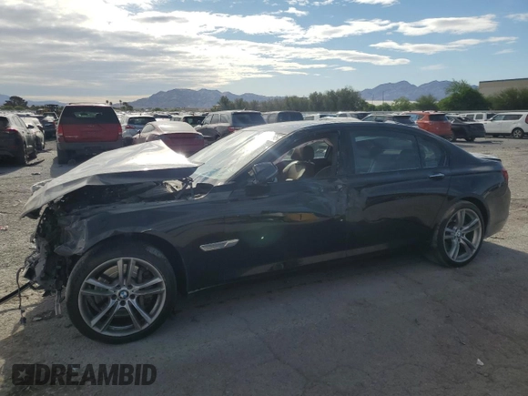 2015 BMW 7 Series 750Li with VIN WBAYE8C59FD781223, listed as a Copart auction lot 54944265 with 125,203 mi miles and Salvage title. Bid and sale history available at DreamBid. Image 1.