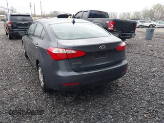 2016 Kia Forte LX with VIN KNAFK4A69G5560835, listed as a IAAI auction lot 42003212 with 100,873 mi miles. Bid and sale history available at carsss.com. Image 3.
