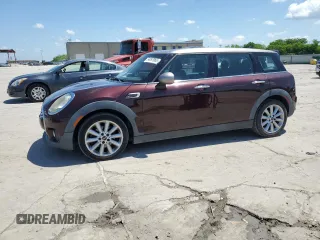 2016 MINI Clubman z VIN WMWLN5C58G2E06674, wystawiony jako Copart lot #54097965 z przebiegiem 94 227 mil mil oraz Czysty tytuł • Clean title. Historia ofert i sprzedaży dostępna na DreamBid. Obrazek 1.