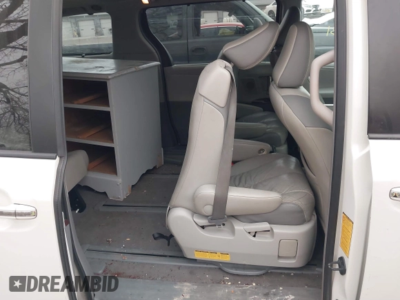 2011 Toyota Sienna XLE AAS with VIN 5TDYK3DC8BS003313, listed as a IAAI auction lot 41830631 with 214,514 mi miles and . Bid and sale history available at DreamBid. Image 8.