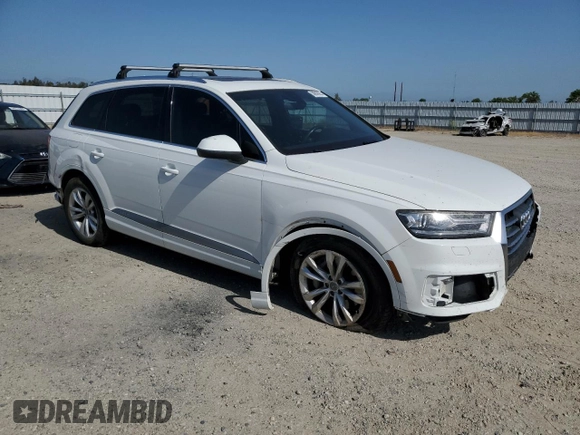 2017 Audi Q7 Premium with VIN WA1AAAF74HD025817, listed as a Copart auction lot 56036985 with 130,410 mi miles and Salvage title. Bid and sale history available at DreamBid. Image 4.