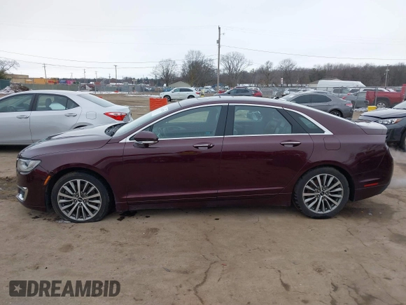 2017 Lincoln MKZ Select z VIN 3LN6L5CC3HR620854, wystawiony jako IAAI lot #41042376 z przebiegiem 131 517 mil mil oraz . Historia ofert i sprzedaży dostępna na DreamBid. Obrazek 14.