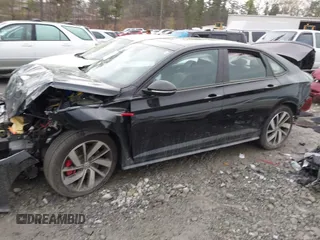 2021 Volkswagen Jetta GLI S with VIN 3VW6T7BU3MM052765, listed as a IAAI auction lot 41908512 with 53,000 mi miles and . Bid and sale history available at DreamBid. Image 13.